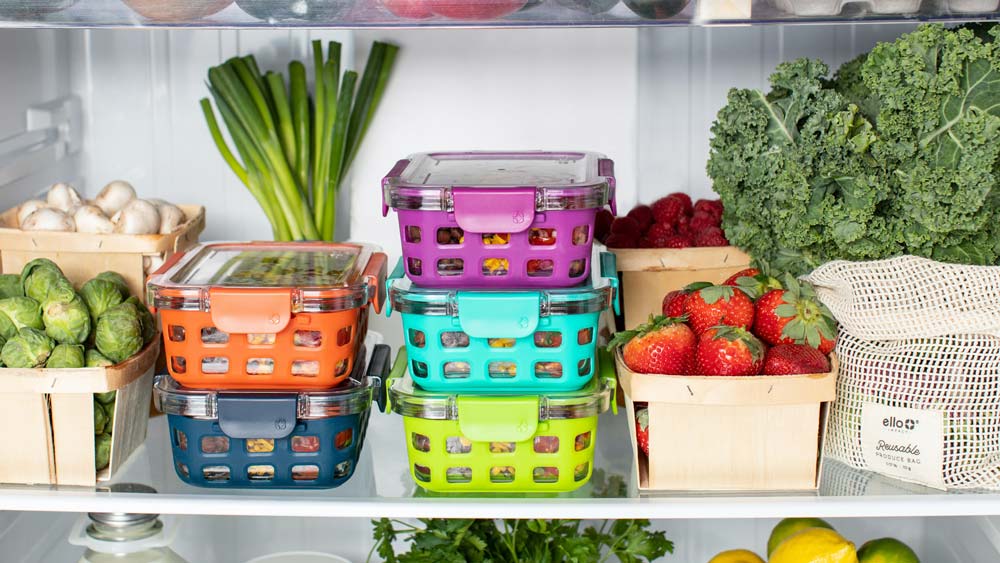The inside of a refrigerator, full of fresh fruits and veggies